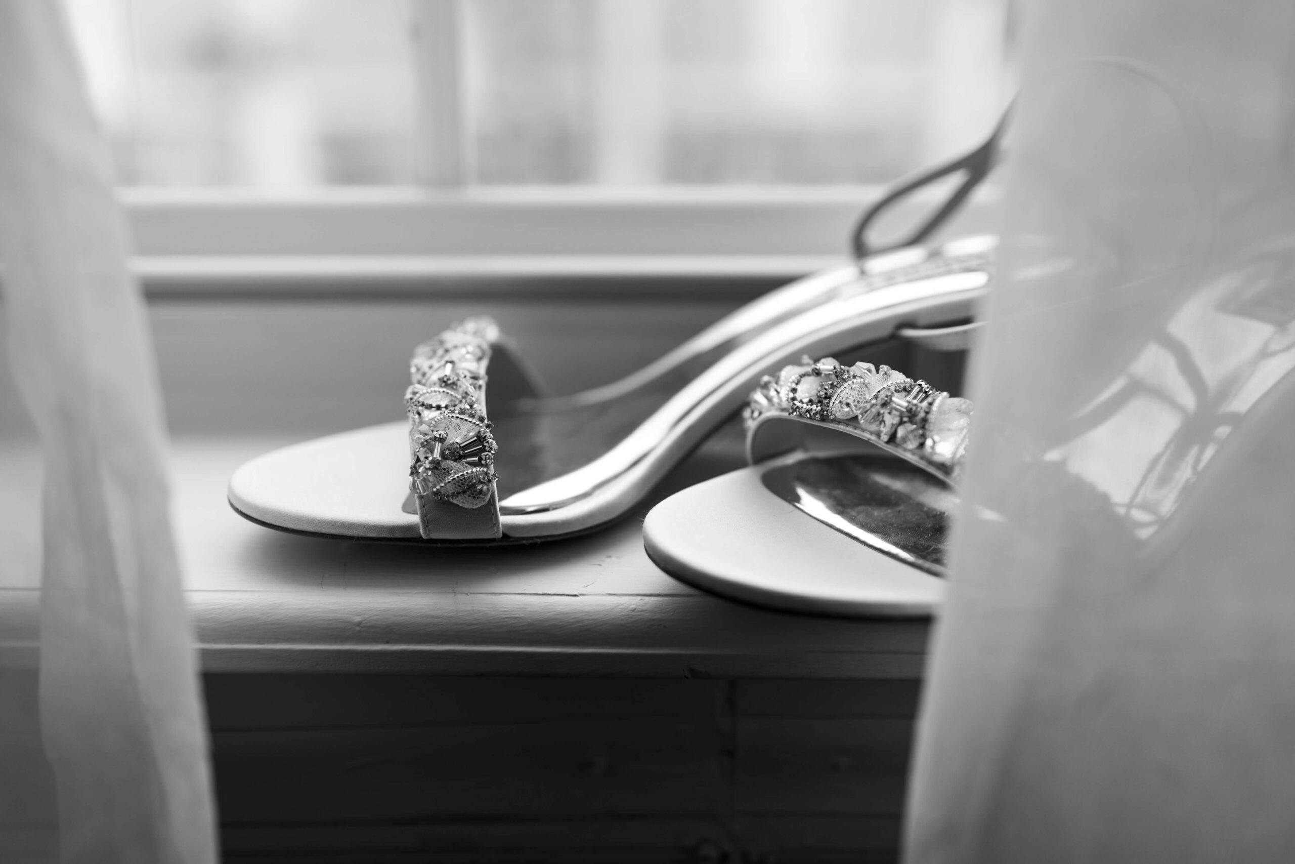wedding heels on a window sill