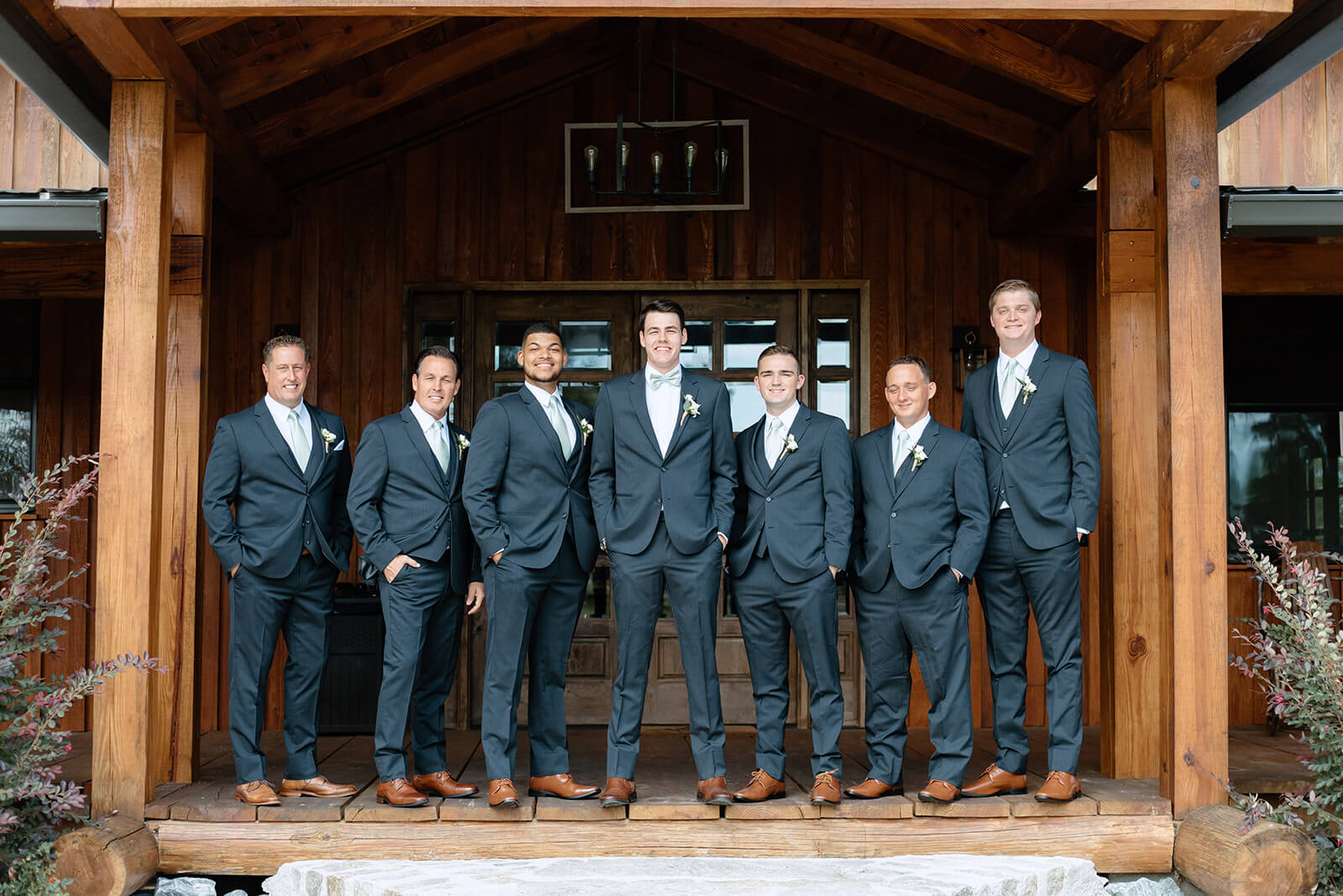 groomsmen stand together