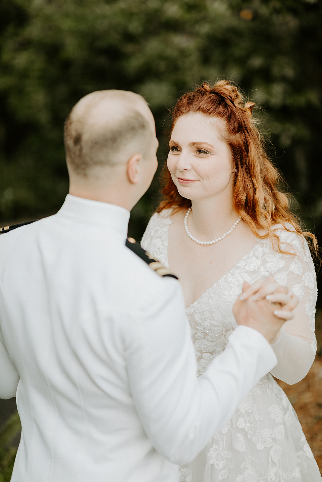 bride and groom look into each other eyes