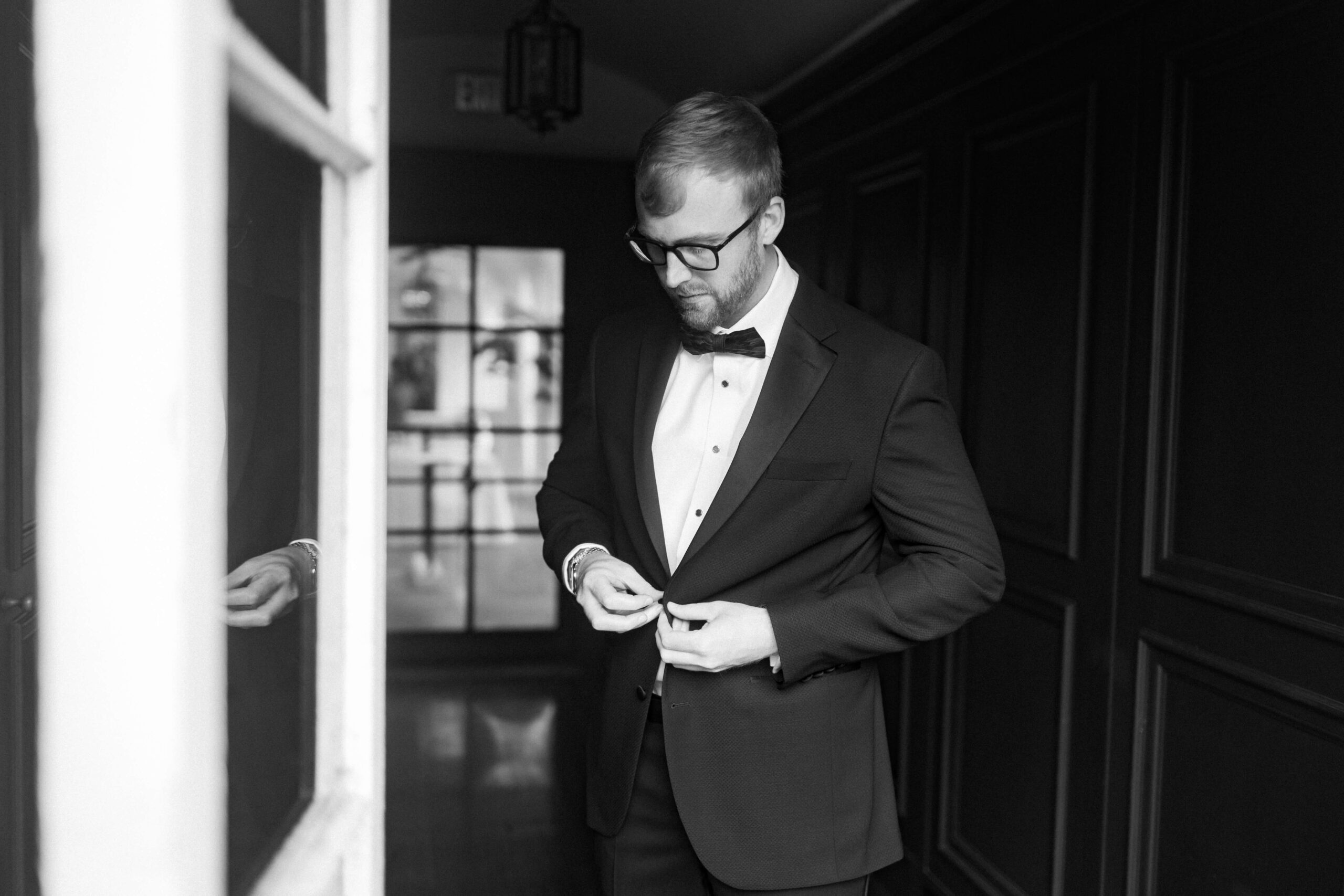 groom buttons suit at wedding at crane cottage jekyll island