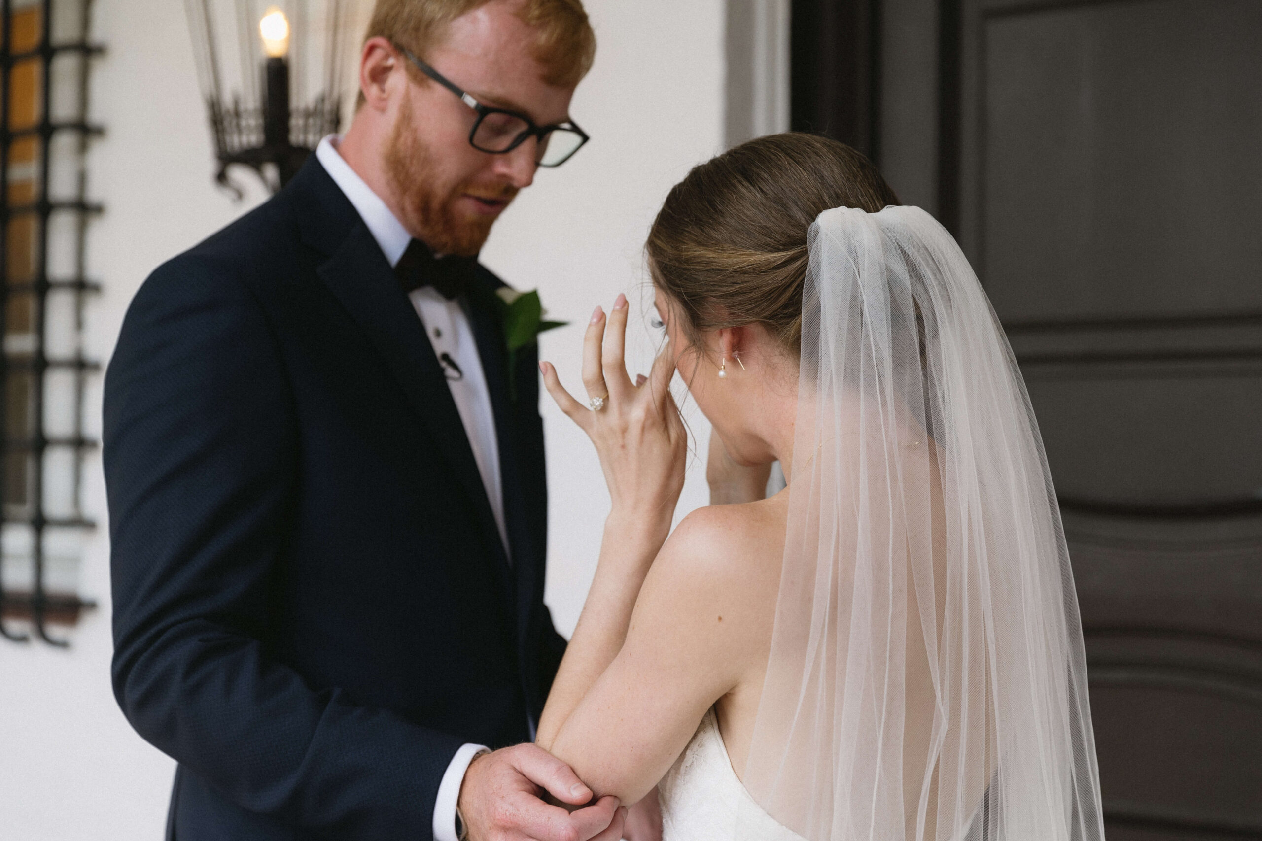 bride crying in front of groom at crane cottage wedding