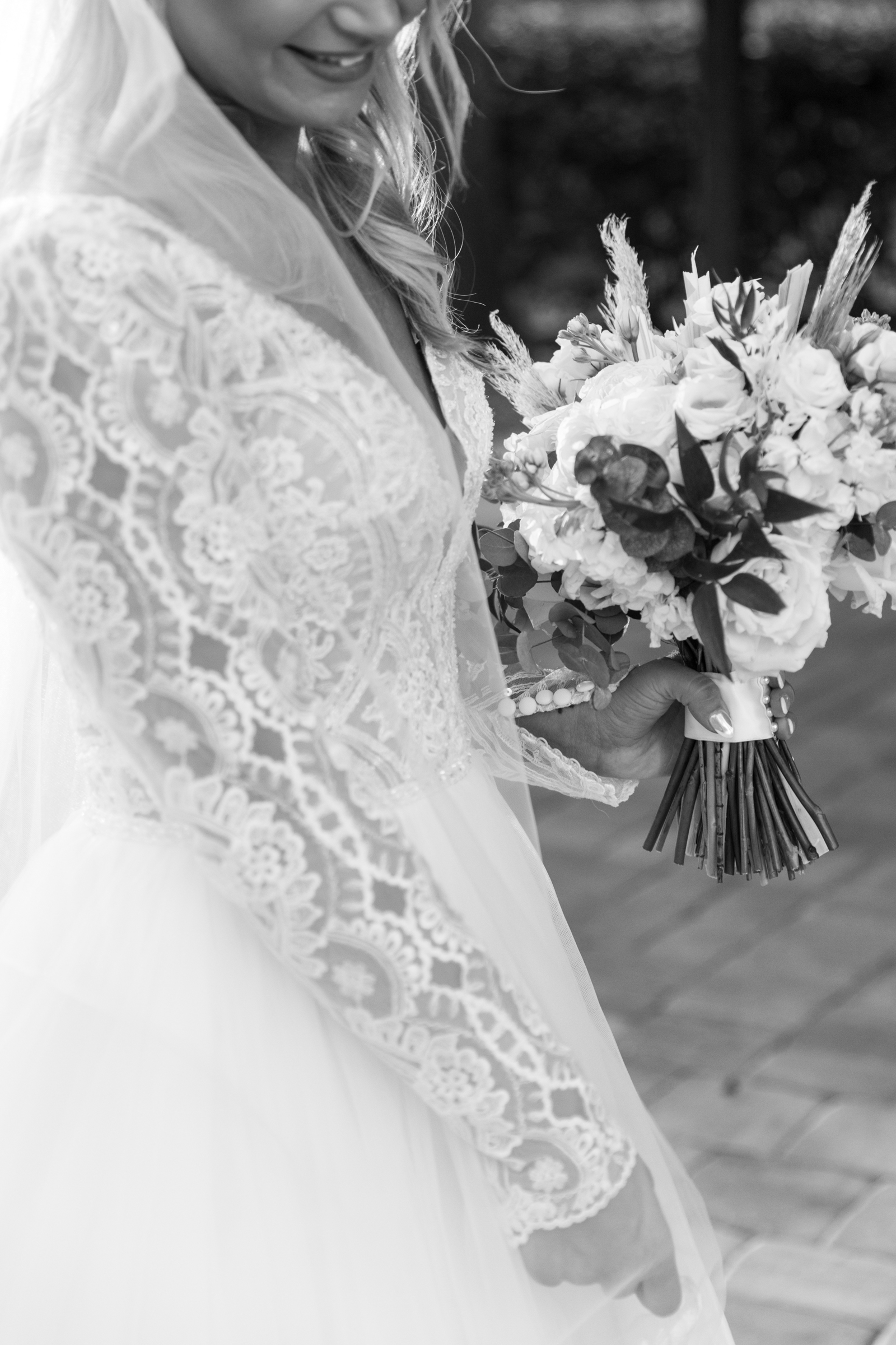 bride holds flowers photo taken by shandi lynn photo