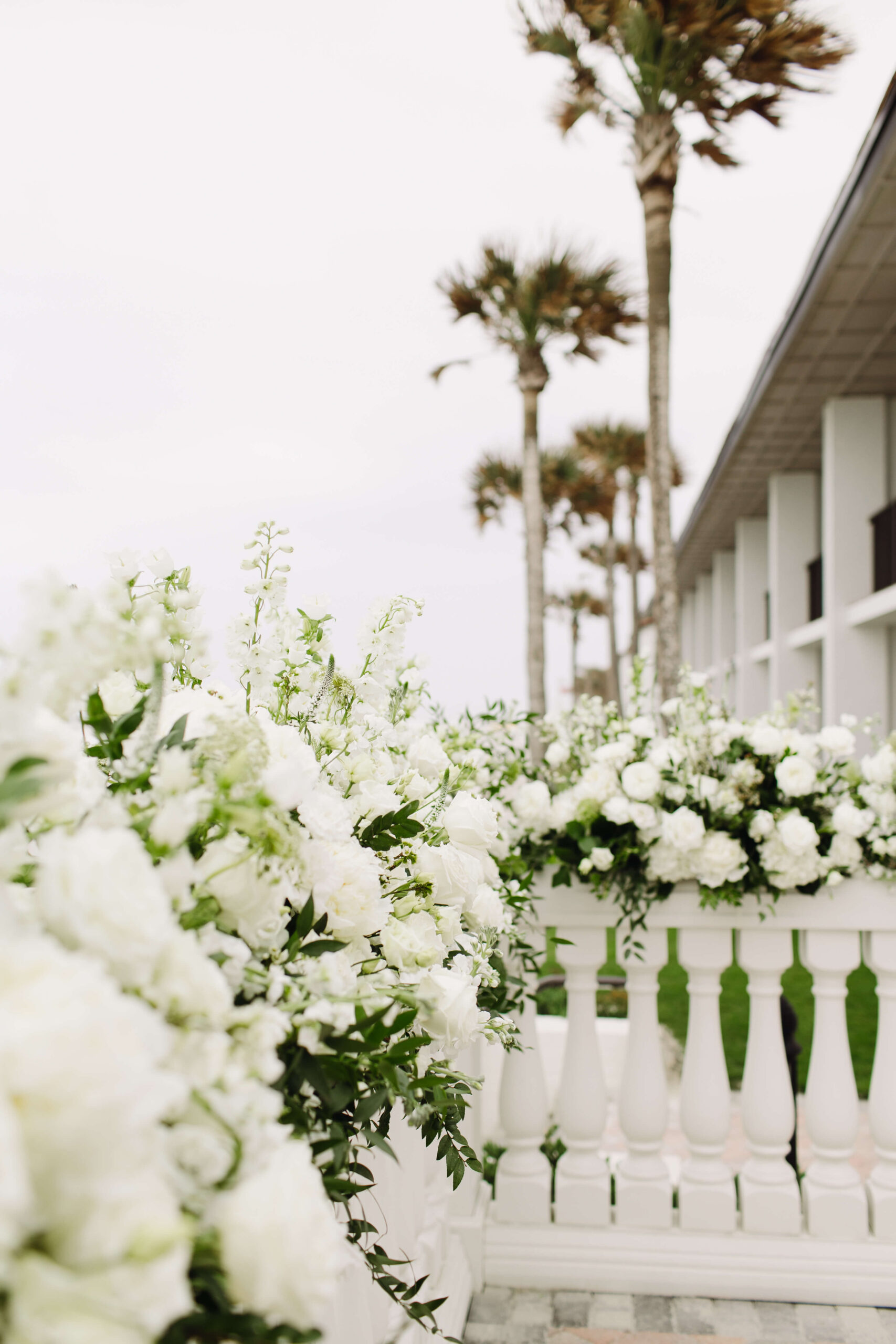 white and green florals on beach in ponte vedra