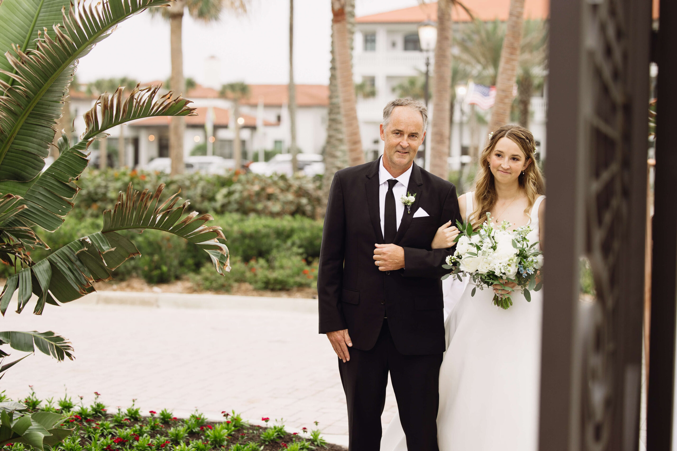 bride walking down aisle with father at ponte vedra inn and club wedding