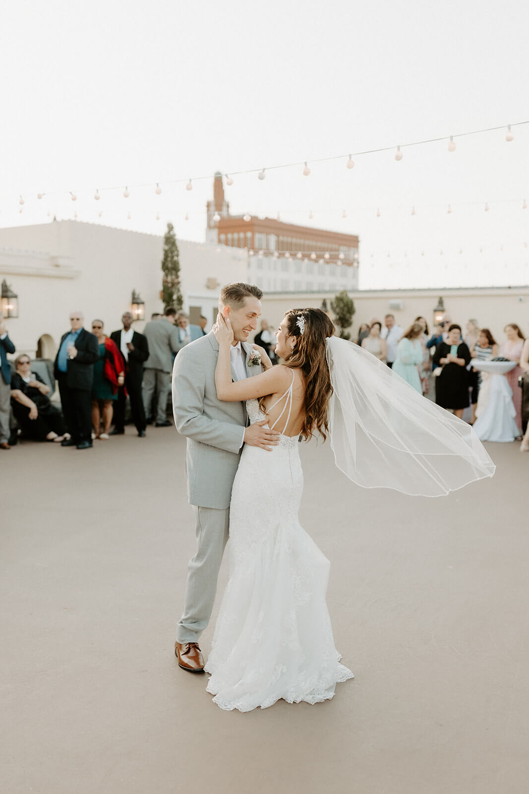 bride and groom dance together at wedding reception in st augustine